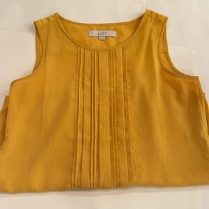 Sleeveless yellow work blouse